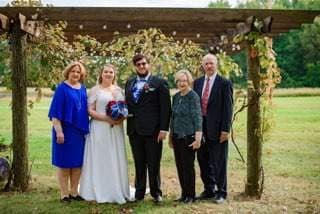 David and Jennifer with their parents at their wedding