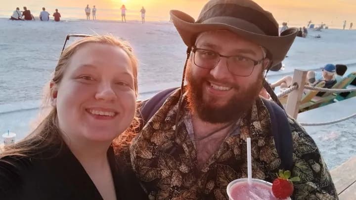 David and Jennifer at the beach at sunset
